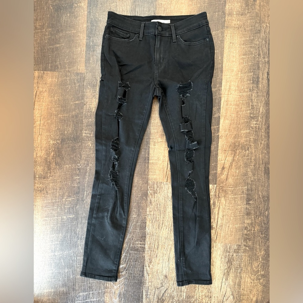Levi’s 711 black distressed skinny denim